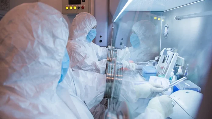 A photo of laboratory workers in the Irkutsk Anti-Plague Research Institute of Siberia and Far East.