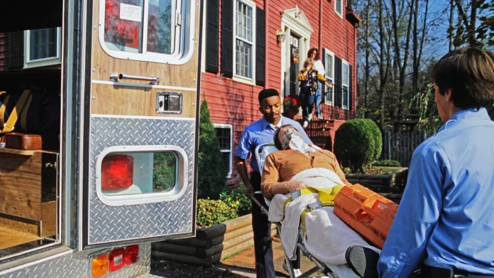 Heart Failure Report: U.S. Headed for Dangerous Territory A photo of paramedics wheeling a man on a gurney from his house to an ambulance as his family looks on.
